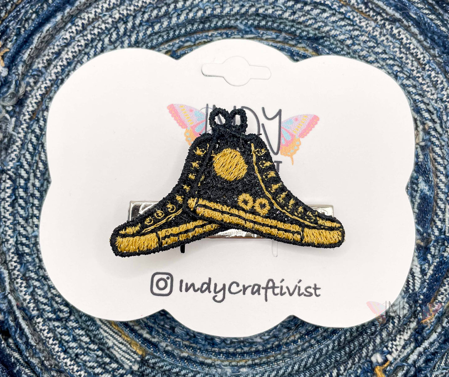 A Pair of I'm Speaking Embroidered Converse Like Hair Clip Black and Gold