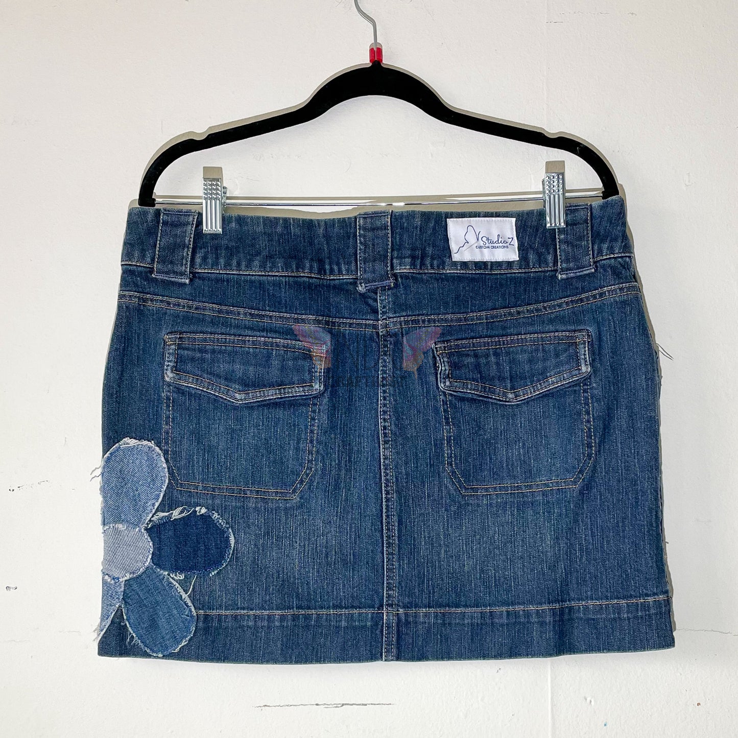 New York and Company Upcycled Denim Skirt with flower detail