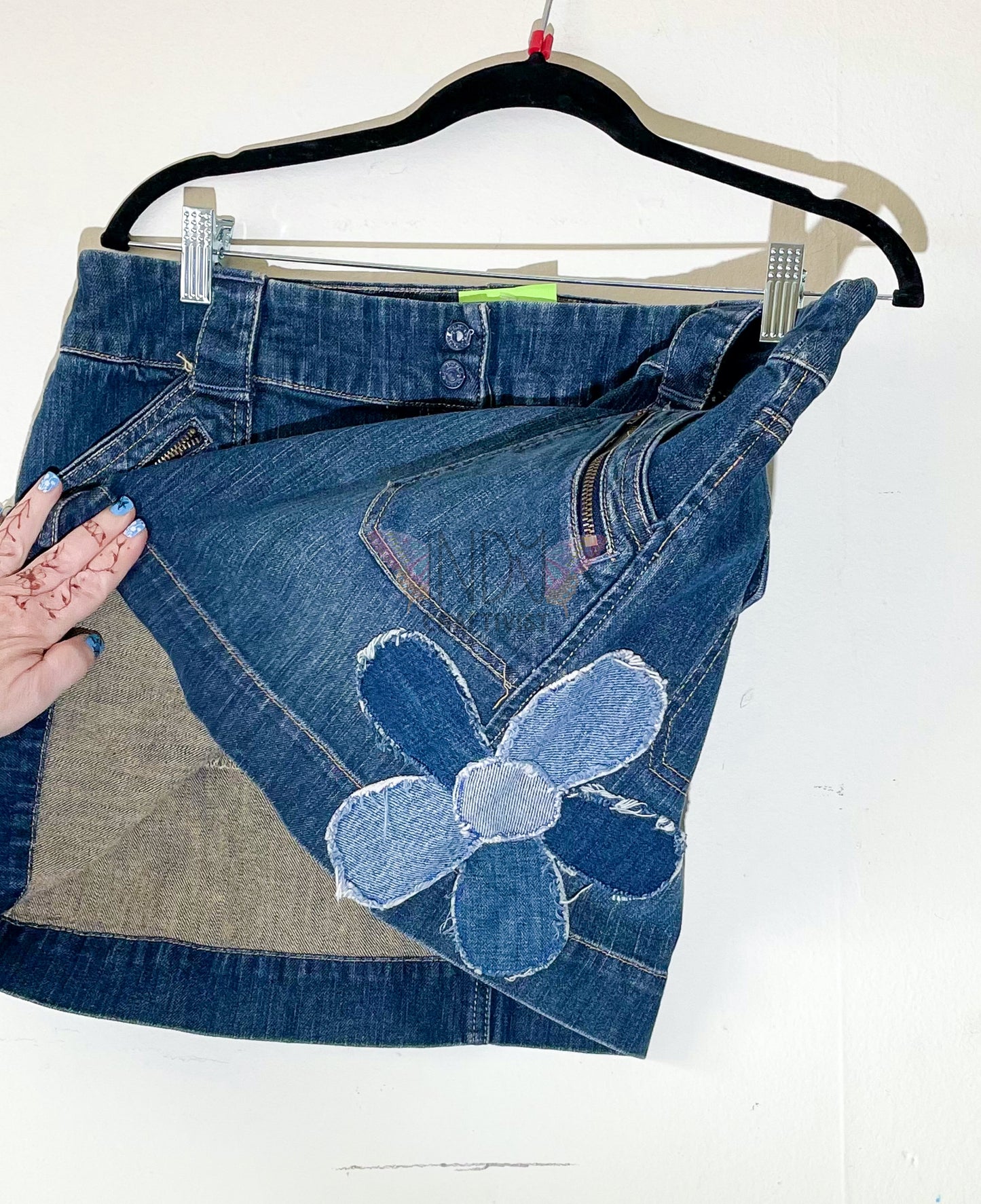 New York and Company Upcycled Denim Skirt with flower detail