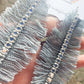 denim feather earrings