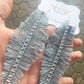 denim feather earrings