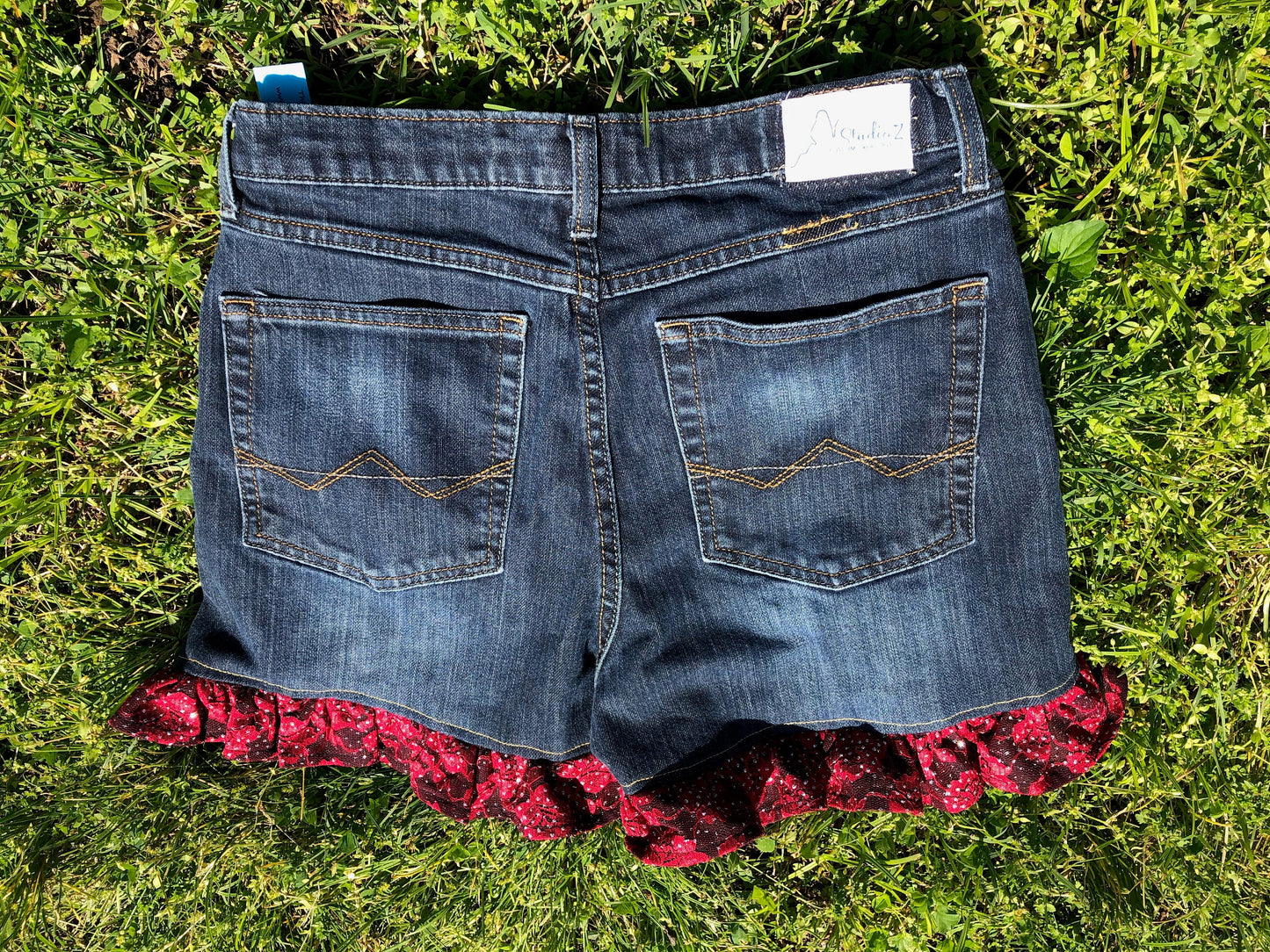 Upcycled Denim Shorts with Red Lace Detail